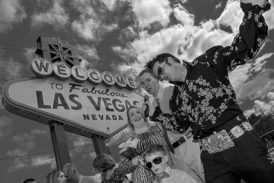 Elvis Photo Tour Couple in Front of Sign - 169 - Vegas Photo Tour -