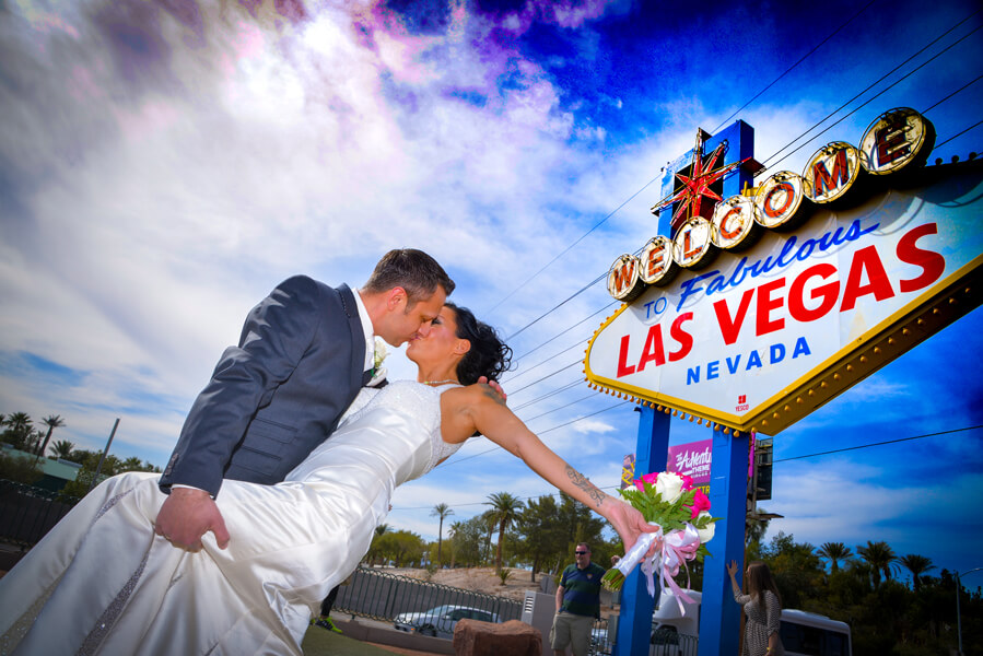 Vegas Limo Photo Tour couple in front of sign - 151 - Vegas Photo Tour -