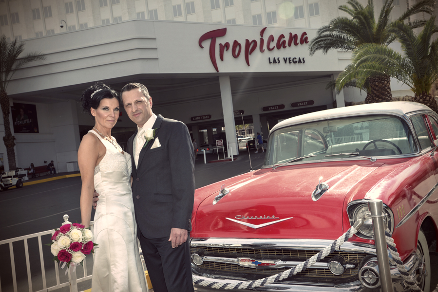 Vegas Limo photo tour couple in front of tropicana car - 153 - Vegas Photo Tour -